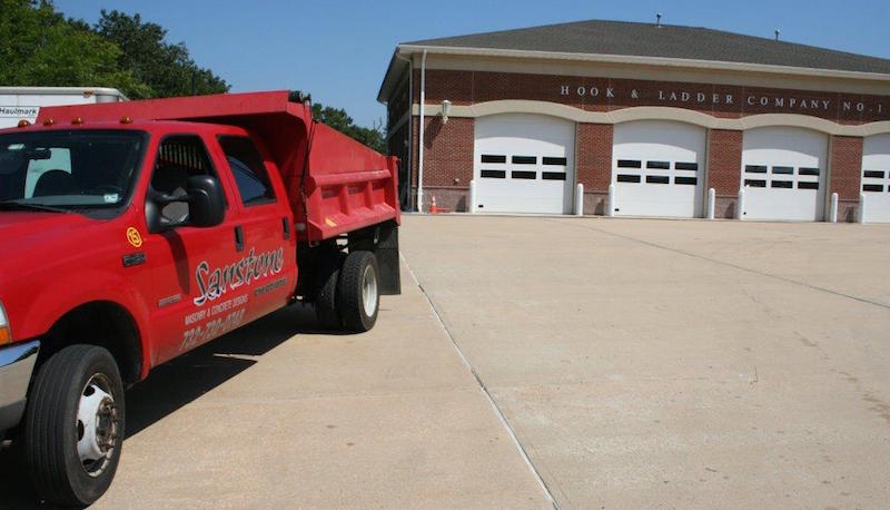 commercial masonry concrete services - firehouse driveway shown