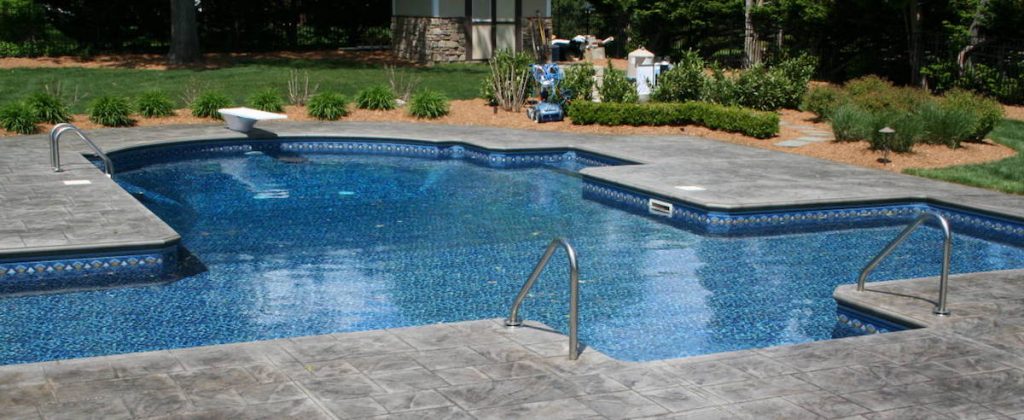 pool patio with stamped concrete