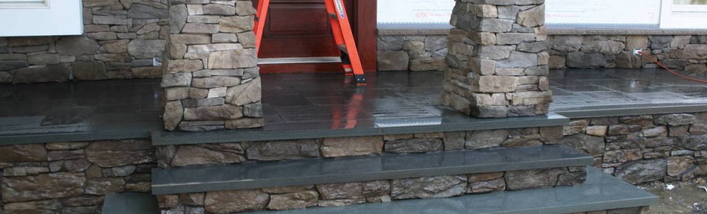 custom stone stairs with bluestone flooring