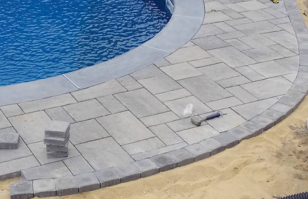 pool patio pavers during installation in Howell NJ