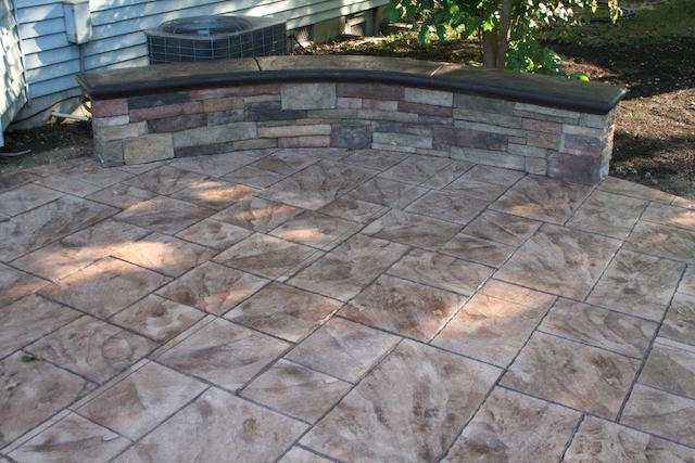 seating wall on stamped concrete patio