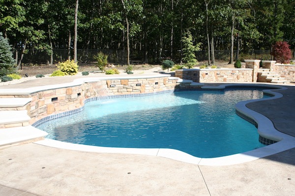 poolscape with 2 sets of outdoor stairs