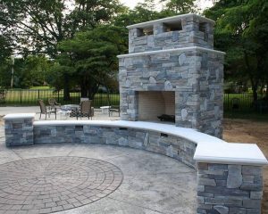 Custom Outdoor Fireplace Wall Seating with Circle Design