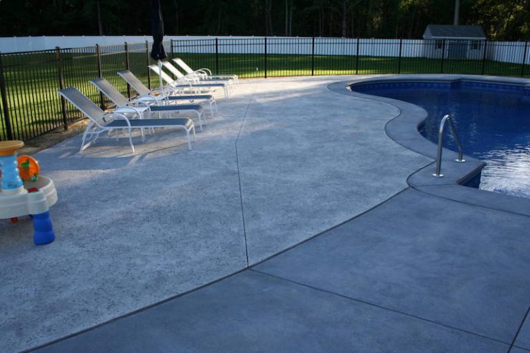 Stamped Concrete Pool Patio by Sanstone Creations