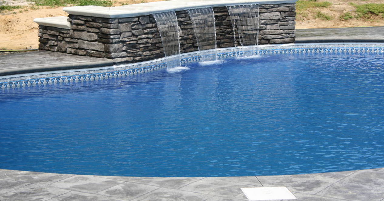 Stone Waterfall Into Pool