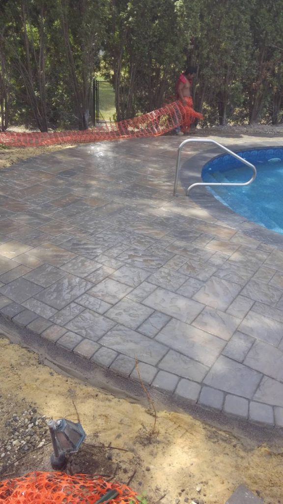 Wet Stone Paver Pool Patio